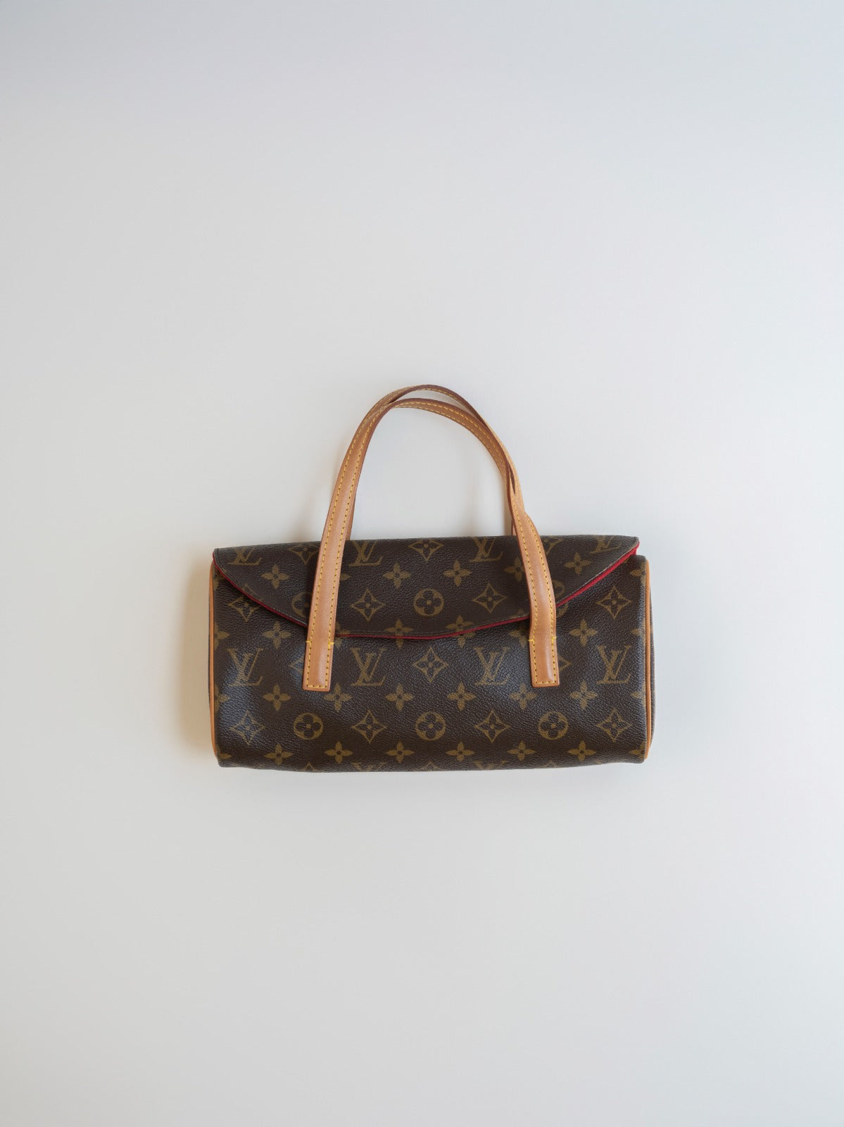 Early 2000s Louis Vuitton monogram “sonatine” bag.