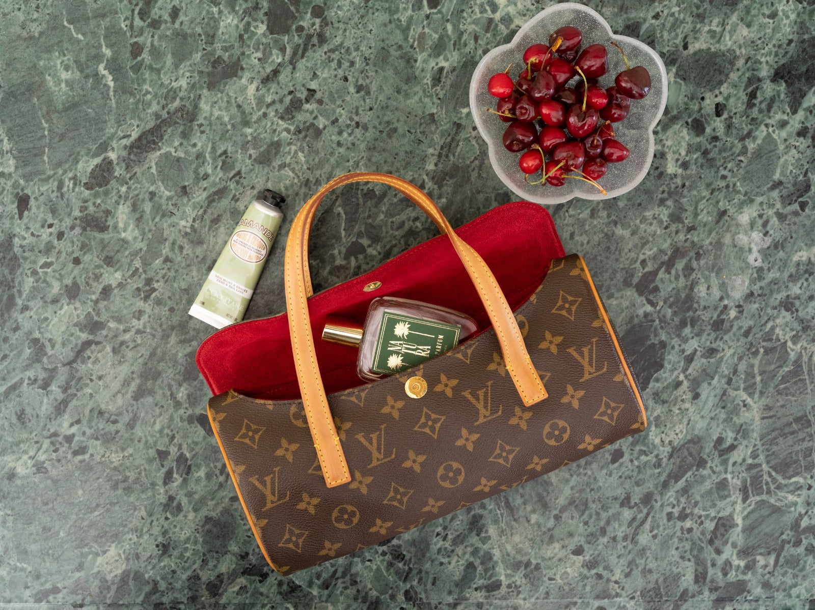 Early 2000s Louis Vuitton monogram “sonatine” bag.