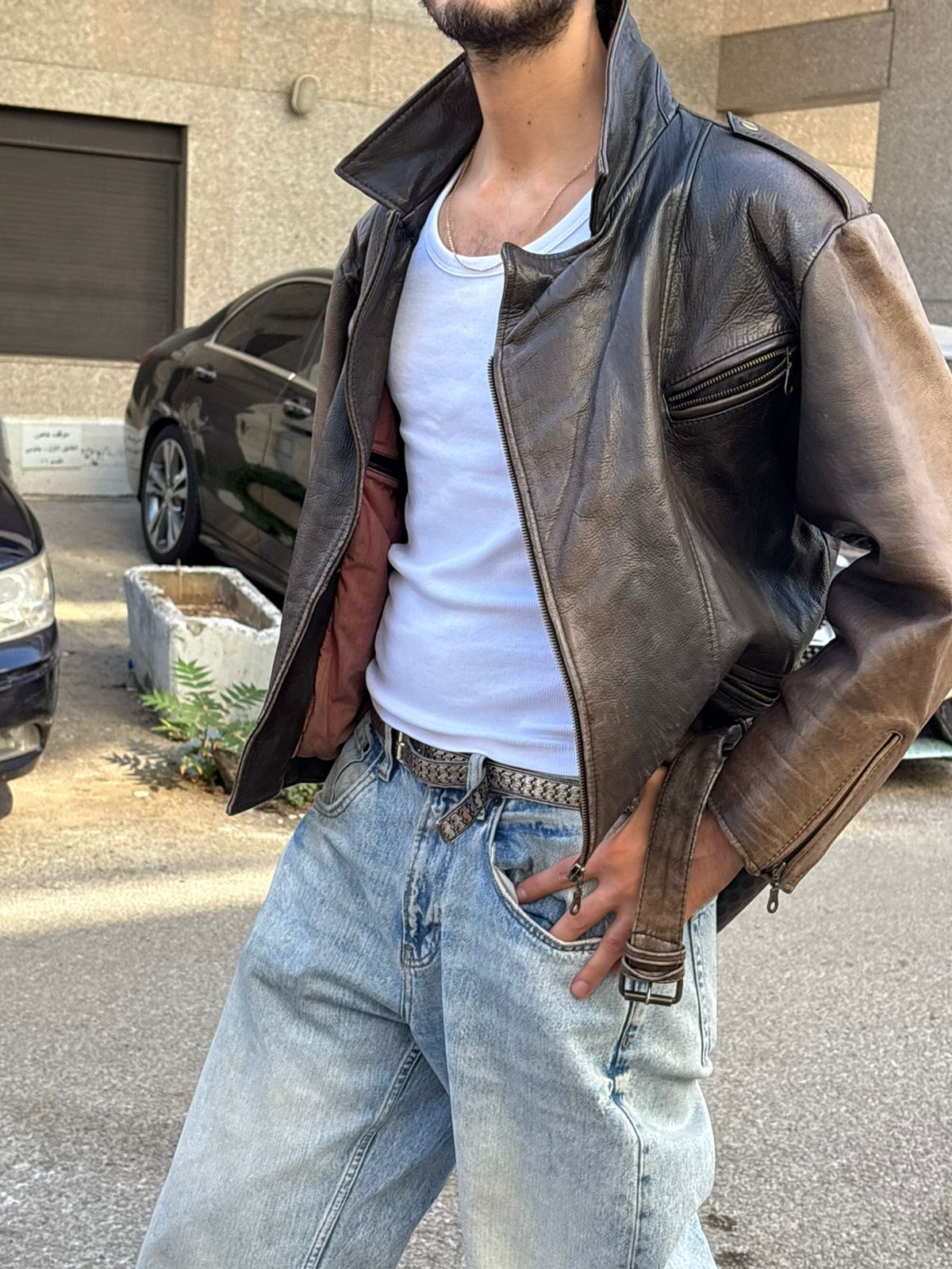 Distressed vintage brown leather jacket