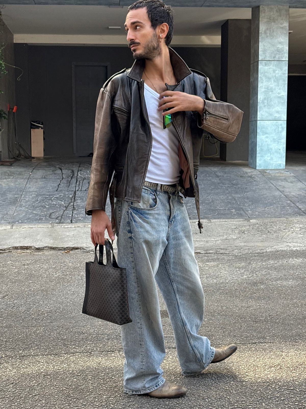 Distressed vintage brown leather jacket